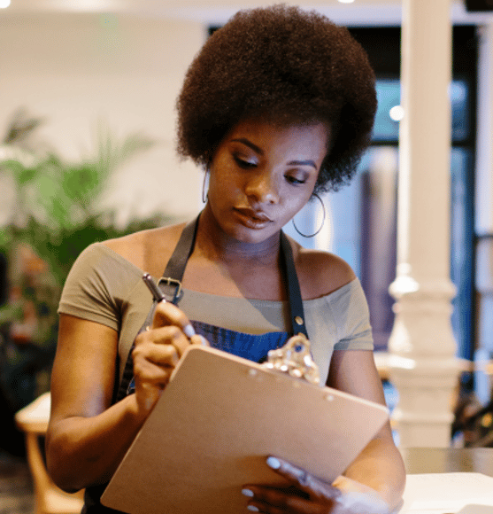 Woman taking notes